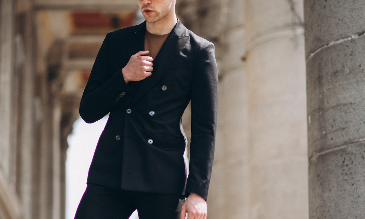 Young man model posing in the street